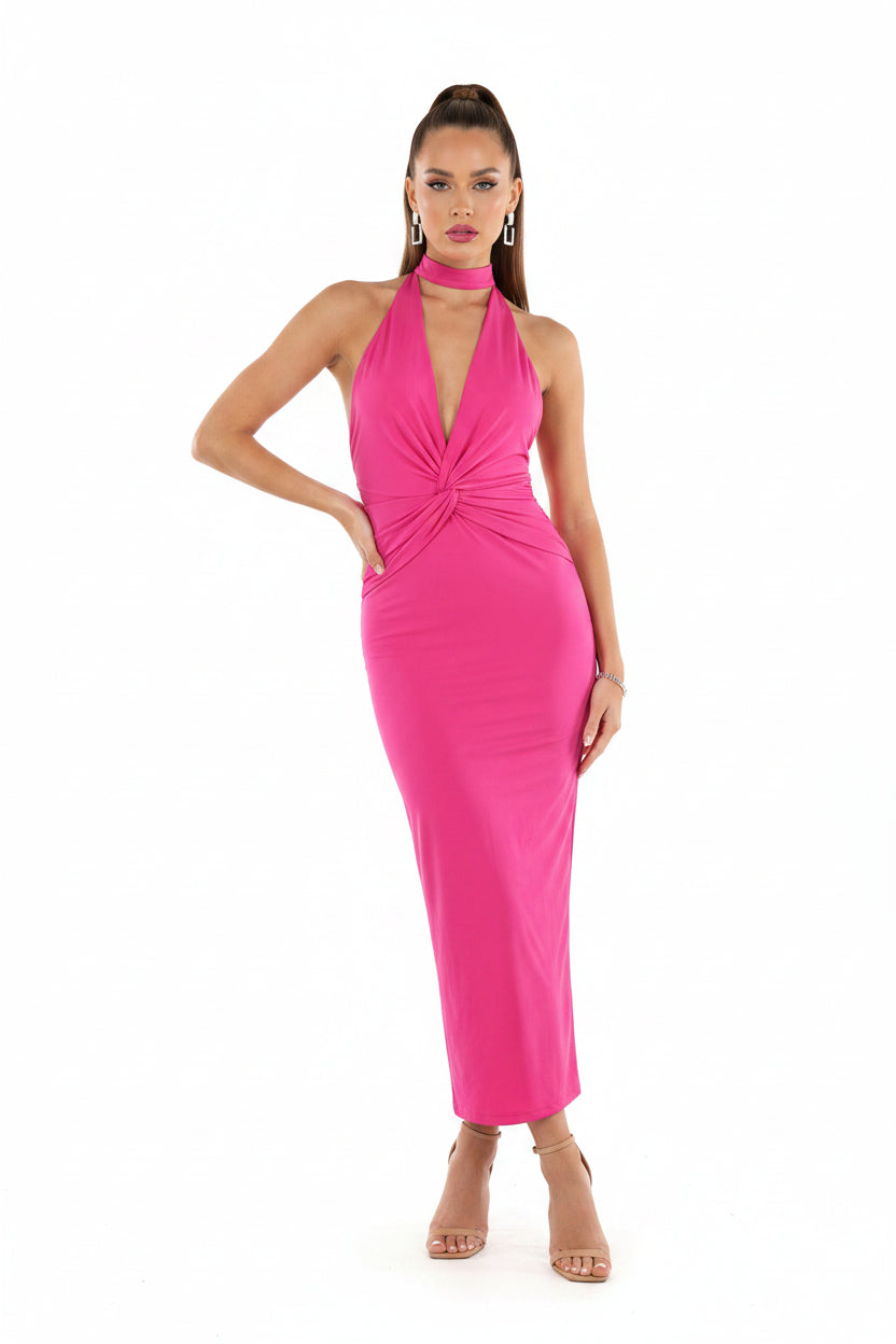 Pink halter neck dress on a woman against a white background
